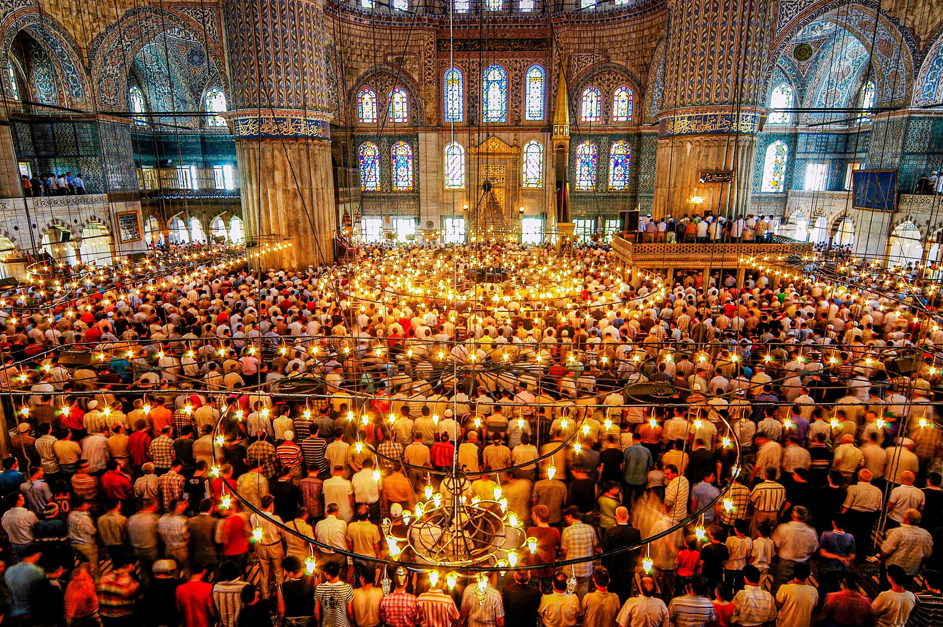 People praying at the Blue Mosque in Istanbul